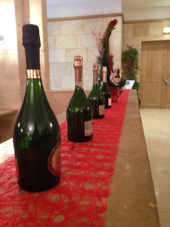 Variety of G.H Mumm Champagne bottles displayed の素材