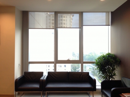 Brightly lighted office waiting area with scenery の素材