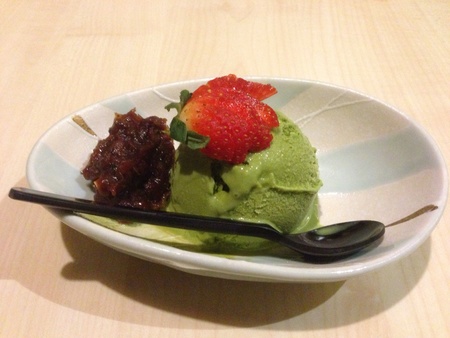 Matcha ice cream with red bean and strawberry topping desertの素材