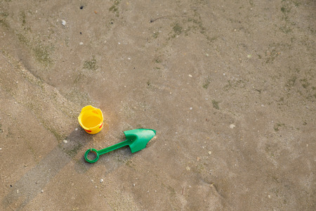Toy and sand on the beach of Thailandの写真素材