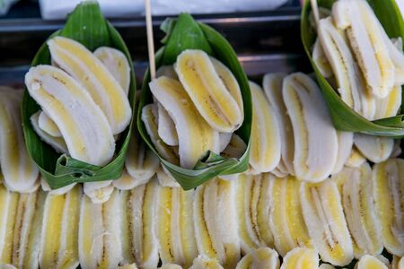 Banana steamed in banana leafの写真素材