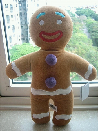 Gingerbread man say merry Christmas to you on morningの素材