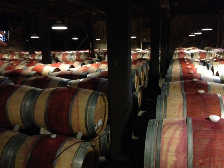 a bunch of wine barrels