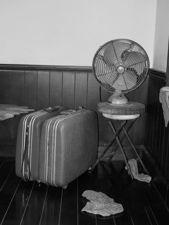 Old vintage luggage bags and fanの写真素材