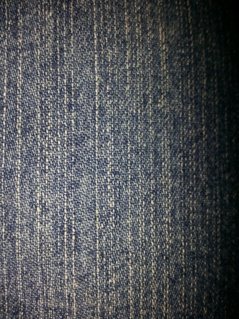 Close up of dark colored jeans patternの素材
