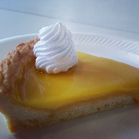 Delicious egg tart topped with fresh creamの素材