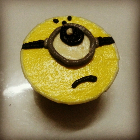 Unhappy Minion Cupcake under dim lightingの素材