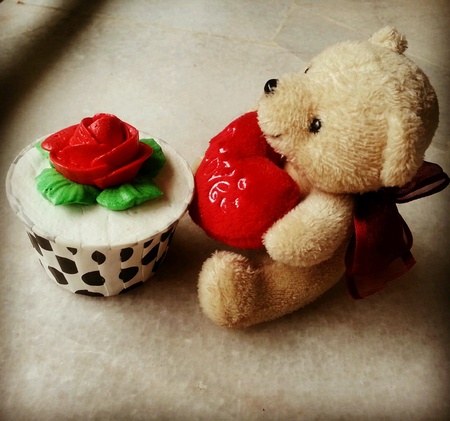 Cute cupcake with teddy bear as giftsの素材