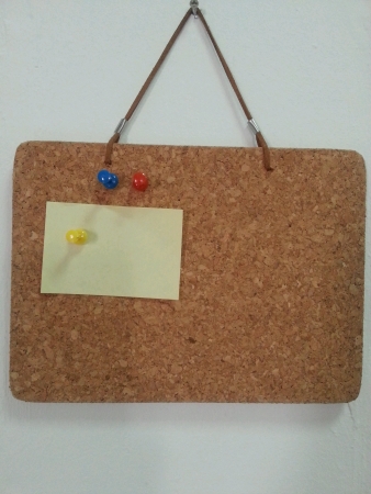 Message board hanging on wallの素材