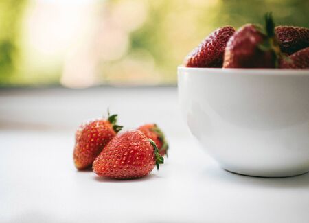 fresh strawberries in a bowlの写真素材