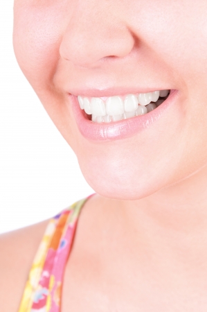 Woman smile. Teeth whitening. Dental care. closeup, isolates on white backgroundの写真素材