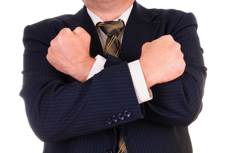  business man with hands across his chest. の写真素材