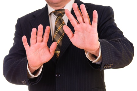 Black dressed businessman showing STOP の写真素材
