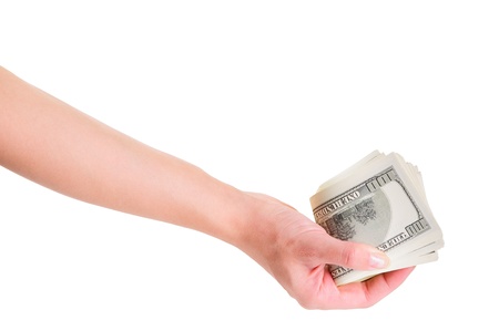 Woman hand with dollars isolated on white background 