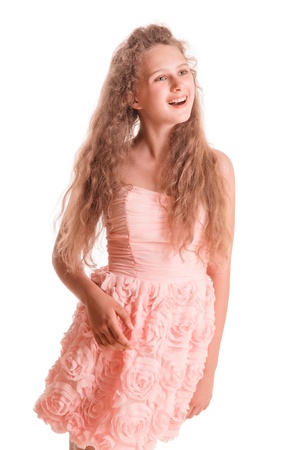 positive teen girl in dress  portrait isolated on white backgroundの写真素材