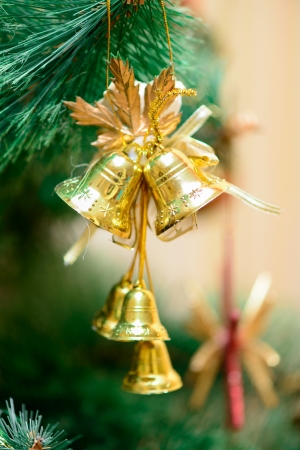 golden bells decorations on Christmas tree. new yearの写真素材