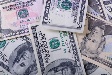 Different dollar banknotes as a background close-up