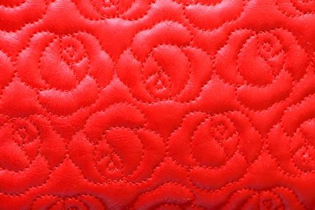 abstract pattern red leather with flowers macroの写真素材