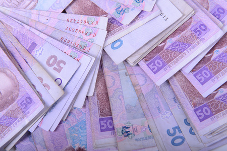 background a lot of Ukrainian hryvnia fifty