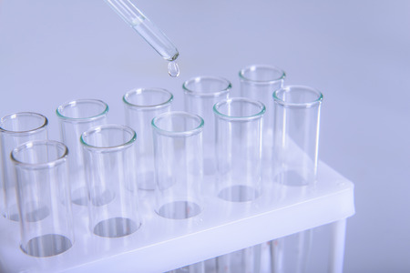 Science laboratory research and development concept microscope with test tubes Laboratory research and equipment chemistry experimentの写真素材