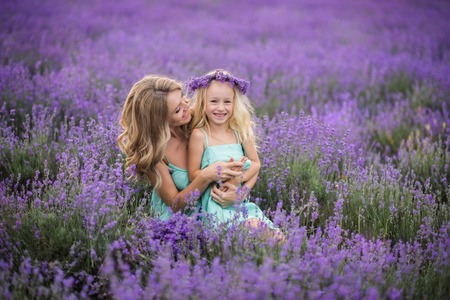 Mom and daughter in a field of lavender.の写真素材