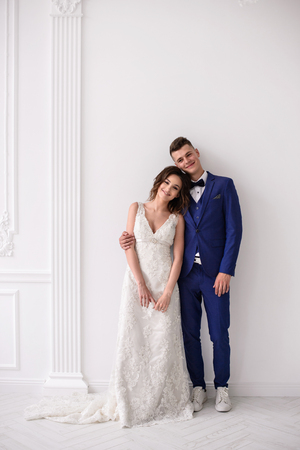 Lovely wedding day. Bride and groom indoorsの写真素材