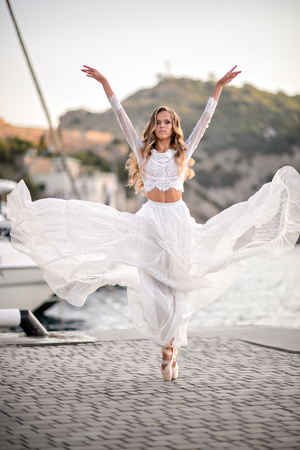 Elegant ballet dancer young girl dancing balletの写真素材