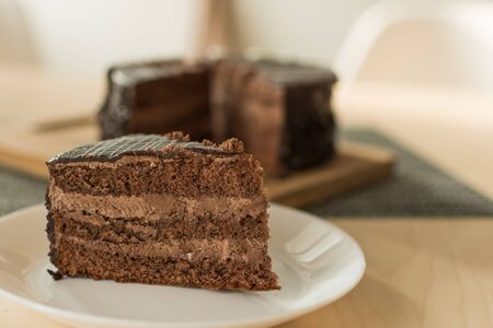Chocolate cut cake top view. Sweet chocolate pie.の写真素材