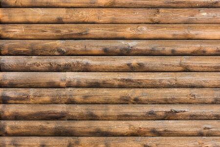 Wooden striped texture, a brown pattern. Wood natural background.の写真素材
