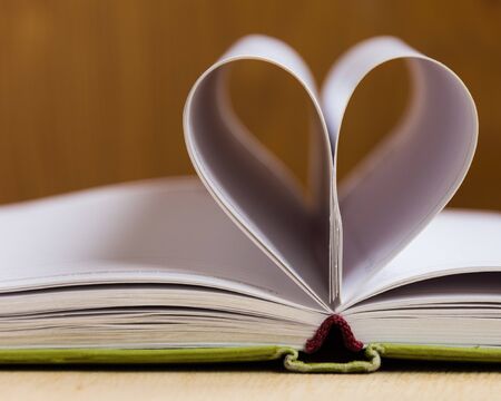 Love, book pages heart. Empty pages of life. Love concept.の写真素材