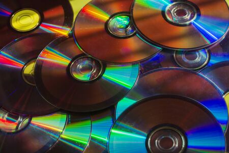 Shiny cd disk pattern. Creative composition with compact computer disks.の写真素材