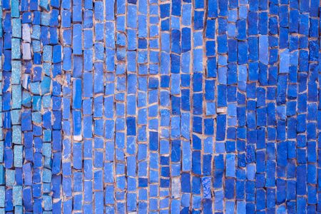 Texture of colorful vintage mosaic wall. Colorful small bricks.Abstract design.の写真素材