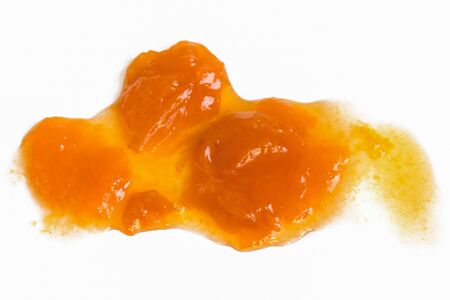 Sweet apricot fruit jam isolated on white background. Healthy vitamins dessert.の写真素材