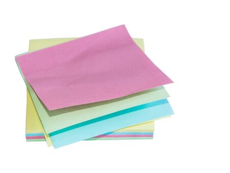 Colorful office stickers isolated on white background. Stack of memo notepaper.の写真素材