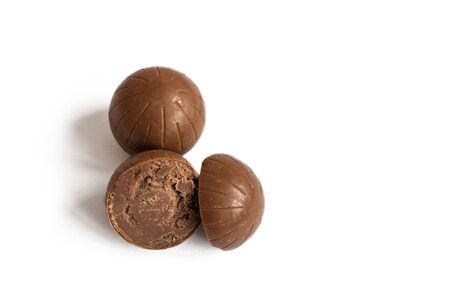 Chocolate candy isolated on white background. Chocolate truffle sweets closeup.の写真素材