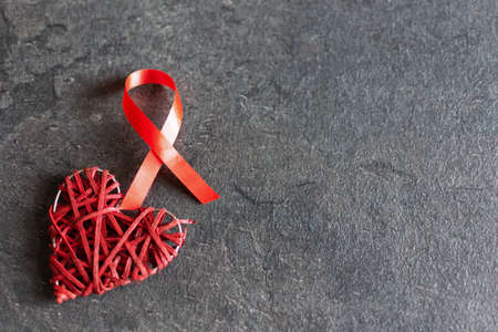 World aids day December 1 with red ribbon, campaign help people with living with HIV.の写真素材