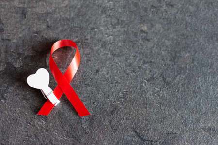 World aids day December 1 with red ribbon, campaign help people with living with HIV.の写真素材