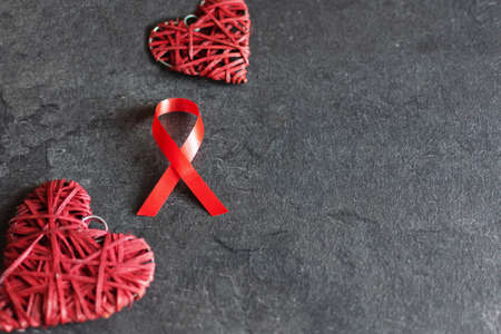 World aids day December 1 with red ribbon, campaign help people with living with HIV.の写真素材