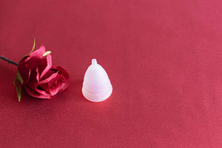 Protection for female hygeine. Menstrual cup, as an ecological way for woman menstrual protection. Copy space.の写真素材