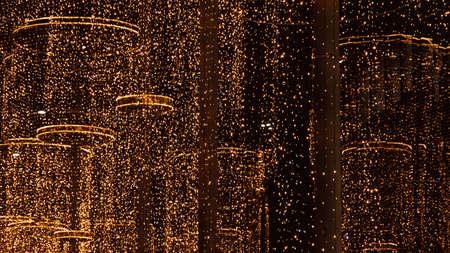 Christmas illumination at night. Abstract christmas lights. New Year's decoration outdoors.の写真素材