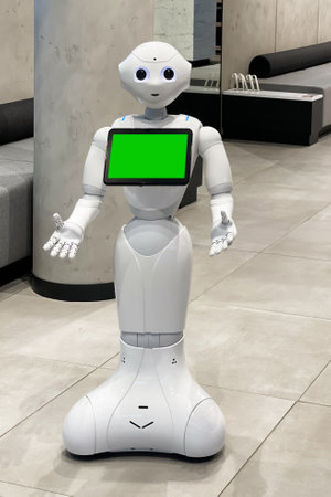 Robotic shopping assistant with blank digital screen for design. Modern internet shopping.の写真素材