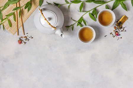 Tea ceremony with teapot and tea cups top view with copy space. Asian tea ceremony.の写真素材