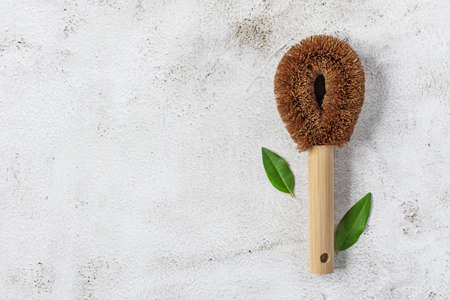 Natural eco friendly cleaning brush top view. Sustainable living concept.の写真素材