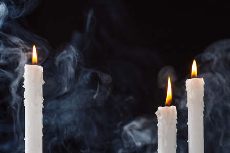 Mysterious Halloween background with candles. Halloween greeting card.の写真素材