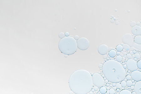 Oil and water bubbles background. Abstract face cleanser bubbles background.