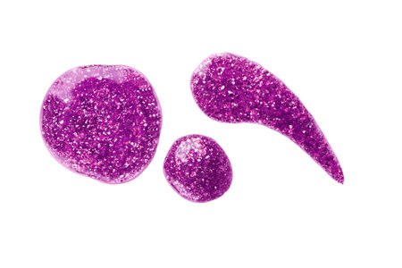 Purple shimmer swatch of gel nail polish or lip gloss isolated on white background. Smear of nail polish for design.の写真素材