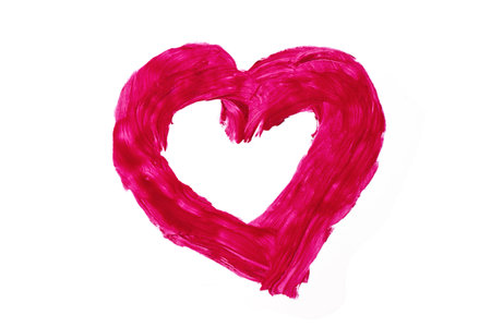 Red lipstick swatch in a heart shape isolated on white background. Brush stroke of lipstick or wet eye shadow for design.の写真素材