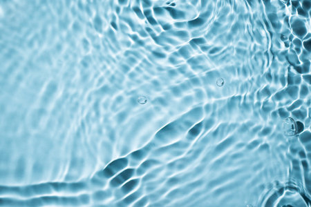 Blue water wave background top view. Abstract water drops texture for design.の写真素材