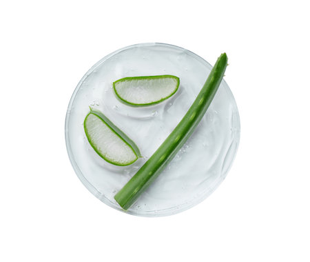 Aloe Vera slices with aloe gel on petri dish on white background. Aloe vera herbal medicine. Natural cosmetics background with copy space.の写真素材