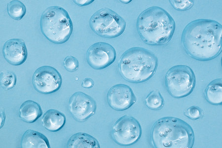 Drops of gel face serum top view. Abstract gel drops for design. Liquid gel moisturizer.